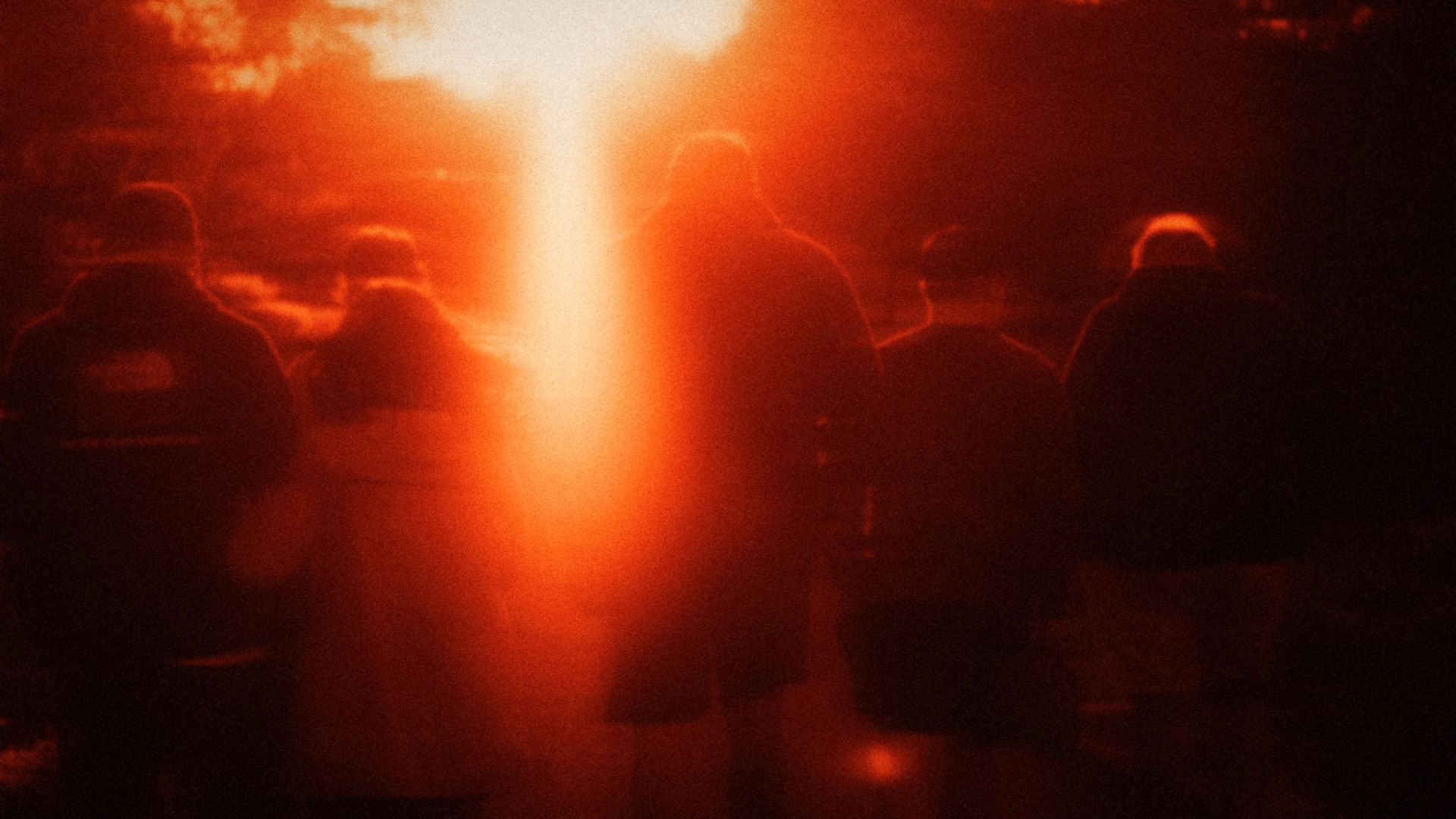 A group walking together into the light